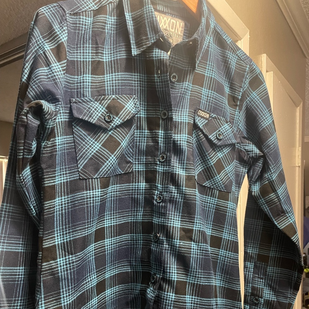 Blue, black, long sleeve flannel in great condition.